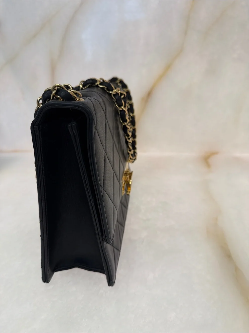 CHANEL Black Quilted Leather Shoulder Bag with Gold Hardware